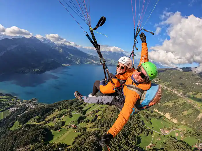 A tandem above the lake with the town on its shore