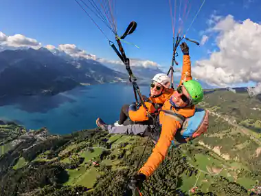 A tandem above the lake with the town on its shore