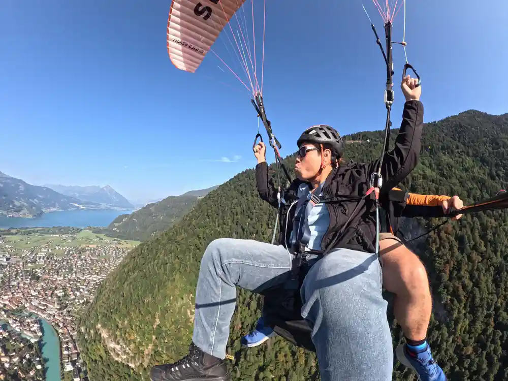 A tandem out over the valley with the lake behind