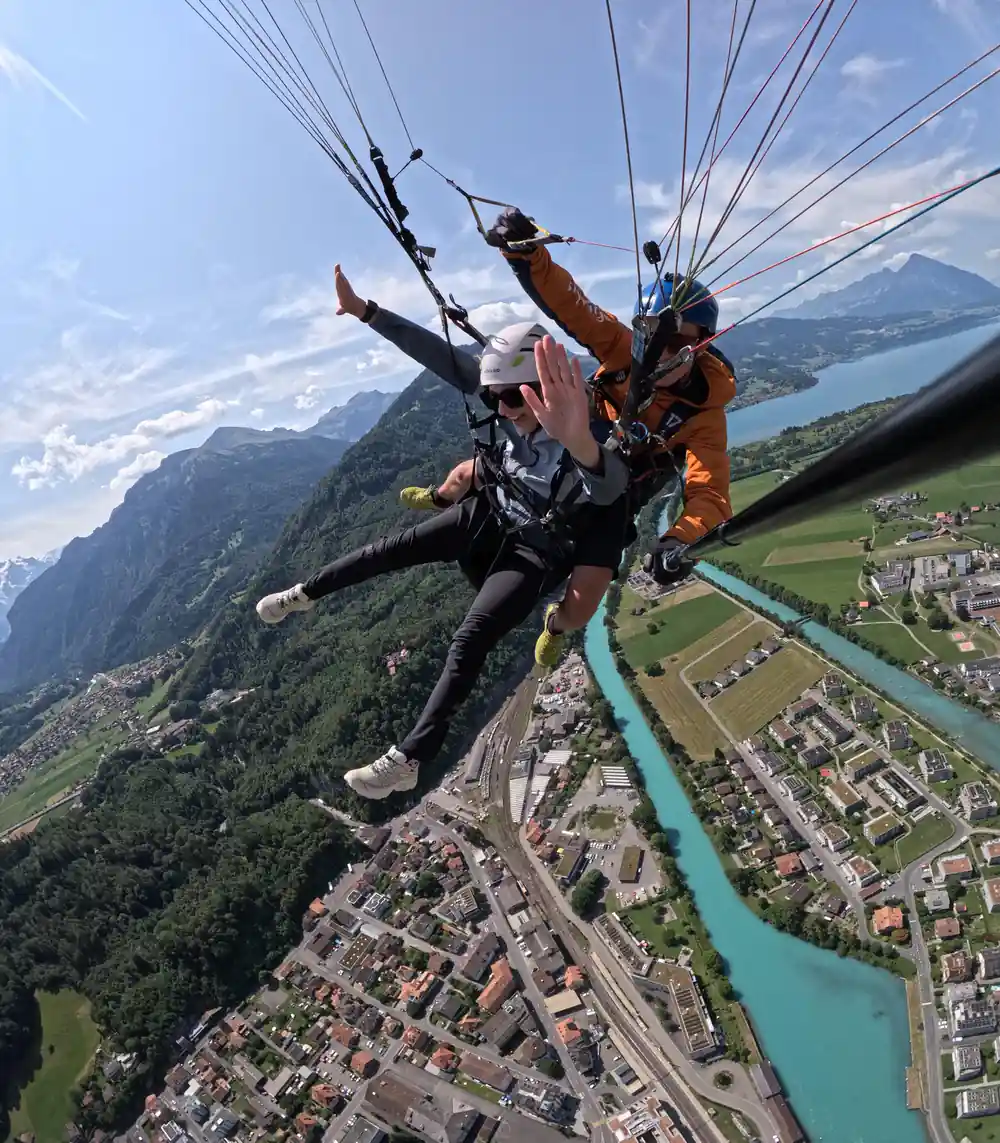 A tandem above the river and the rooftops