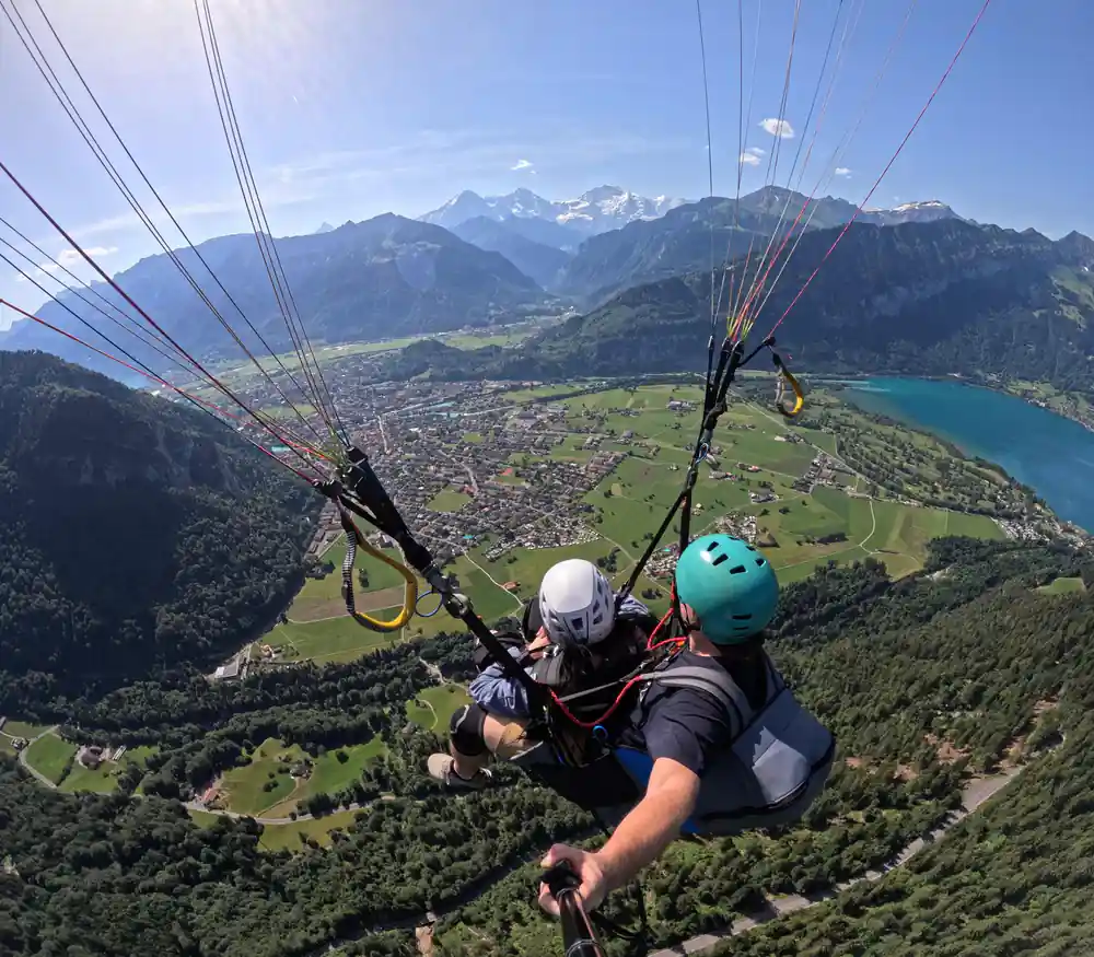 A tandem seen from behind above the valley floor