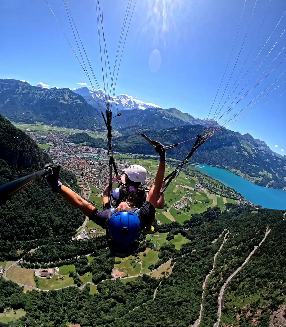 A tandem above the town with the lake behind